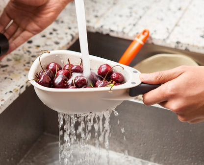 [half-width] Droplet Mini White Colander with Folding Handle