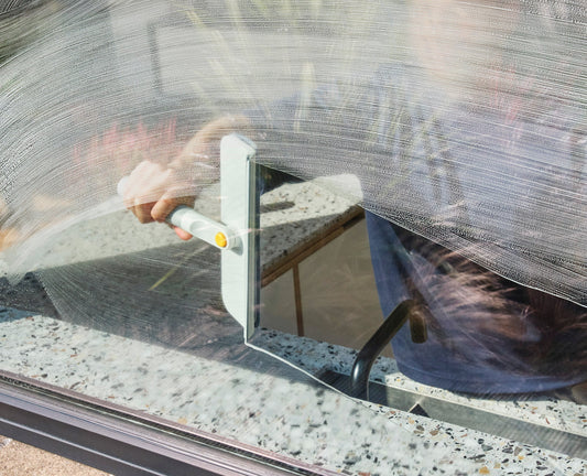 [hidden] [lifestyle] CleanTech™ 2-in-1 Glass Cleaning Tool with Replacement Pad