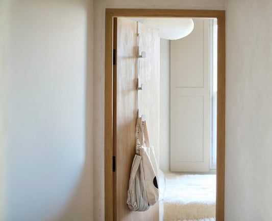 [hidden] [lifestyle] Orderly™ Ecru Over-Door Handbag Storage Holder