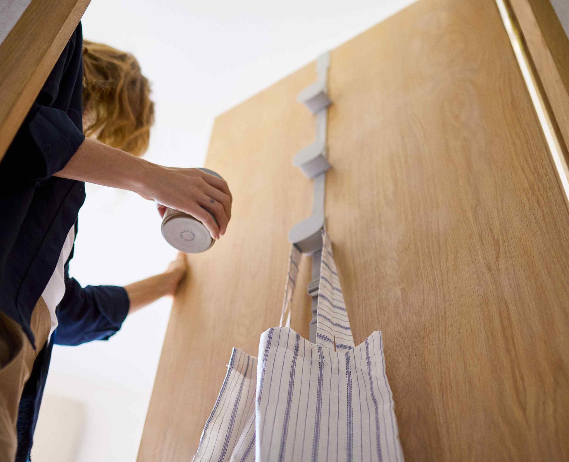 [half-width] Orderly™ Ecru Over-Door Handbag Storage Holder